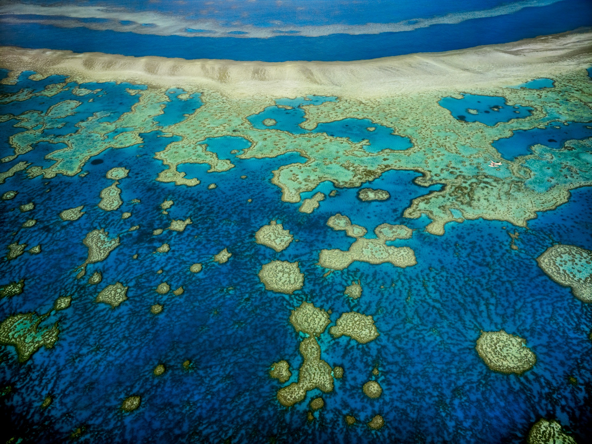 An aerial view of the islands of the Great Barrier Reef in Queensland, Australia