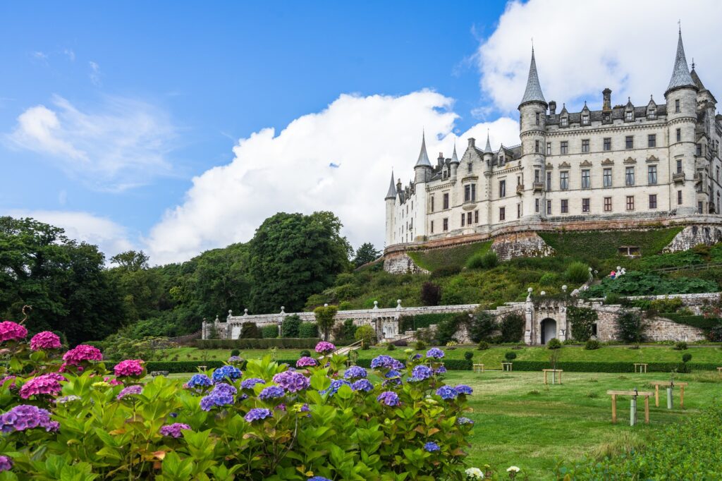 21 Enchanting Castles in Scotland You Must Explore 8 Beautiful shot of the famous Dunrobin Castle, in Sutherland, Scotland