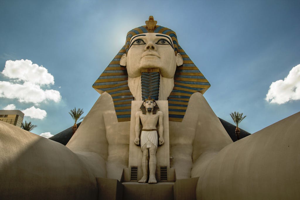 8 Extraordinary Pyramids You Can't Miss 7 Close-up of the Luxor Hotel Sphinx under a clear blue sky in Las Vegas.