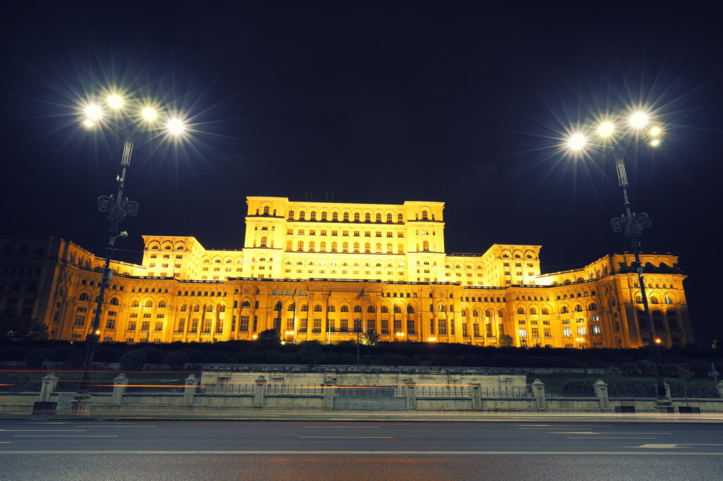 15 Extraordinary Destinations You Can’t Miss in Romania 16 Dramatic evening view of Palace of the Parliament Bucharest city