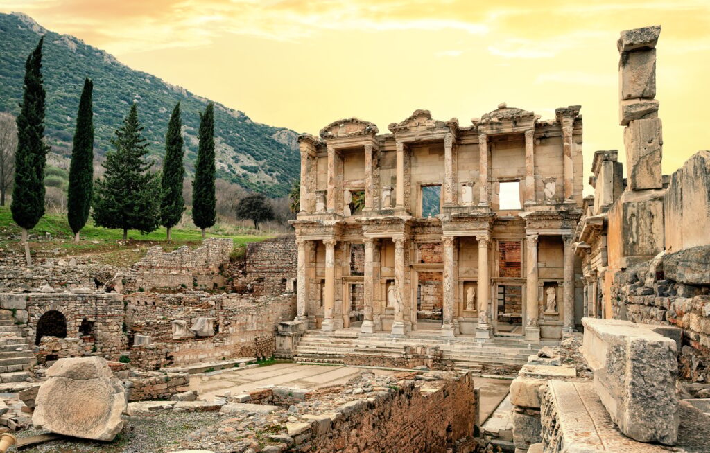 12 Ancient Roman Monuments That Will Transport You Through Time 6 Facade of Library of Celsus in Ephesus under yellow sky