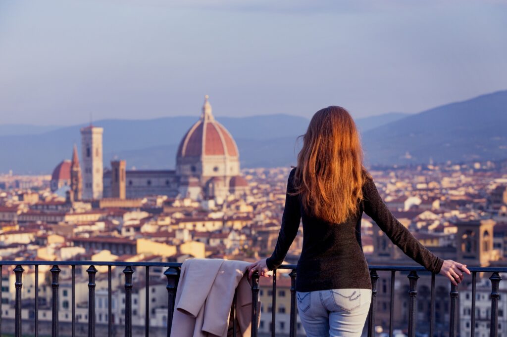 8 Enchanting Honeymoon Destinations to Ignite Your Love 2 girl looking at the Florence