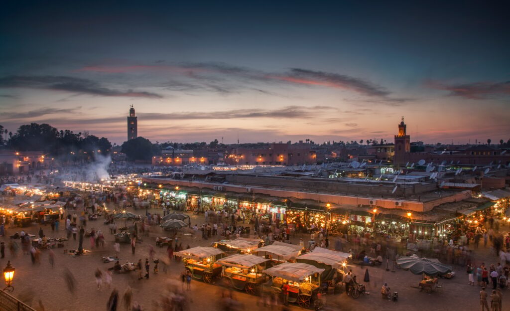 17 Enchanting Destinations in Morocco That You Must Experience 2 Jemaa el-Fnaa Square illuminated at dusk, Marrakesh, Morocco