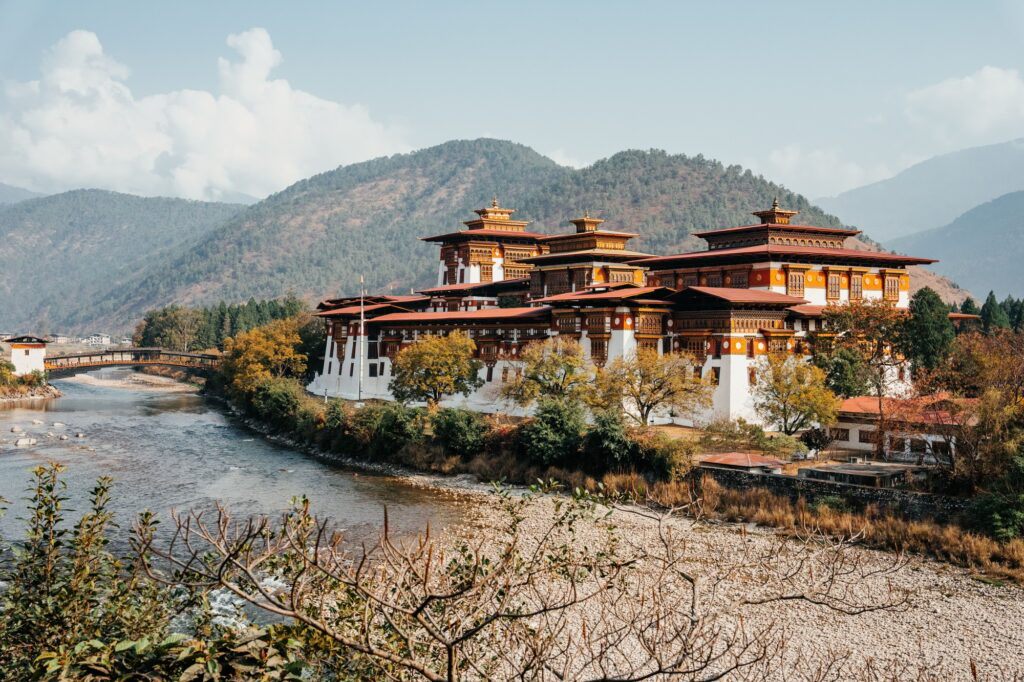 10 Extraordinary Monasteries You Must Explore 4 Punakha Dzong monastery by the river in Bhutan.