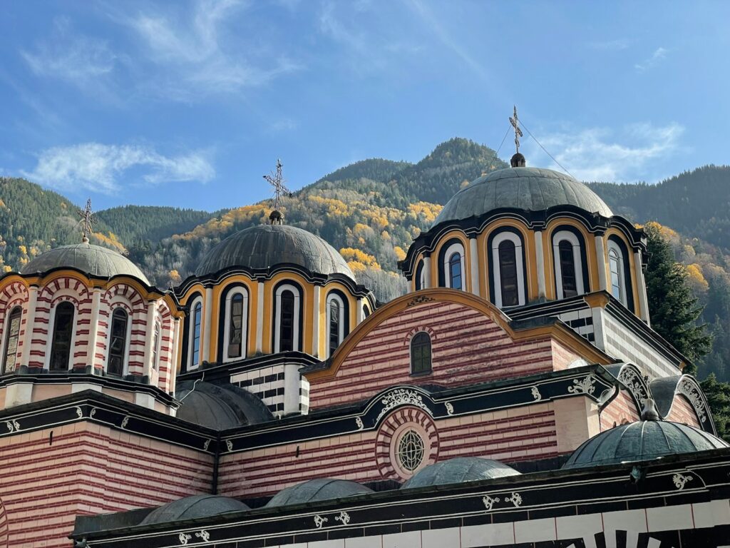 a large building with a clock on the top of it
