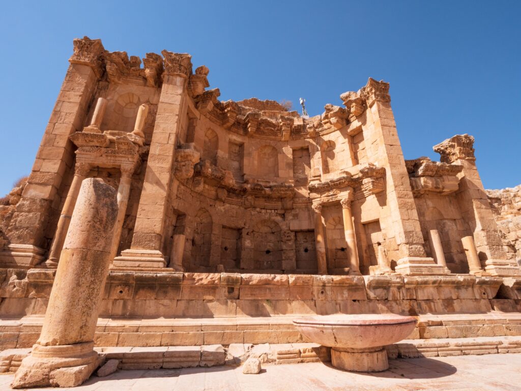 12 Ancient Roman Monuments That Will Transport You Through Time 8 Ruins of old city, details of famous historical Roman Nymphaeum, ancient structure in Jerash, Jordan