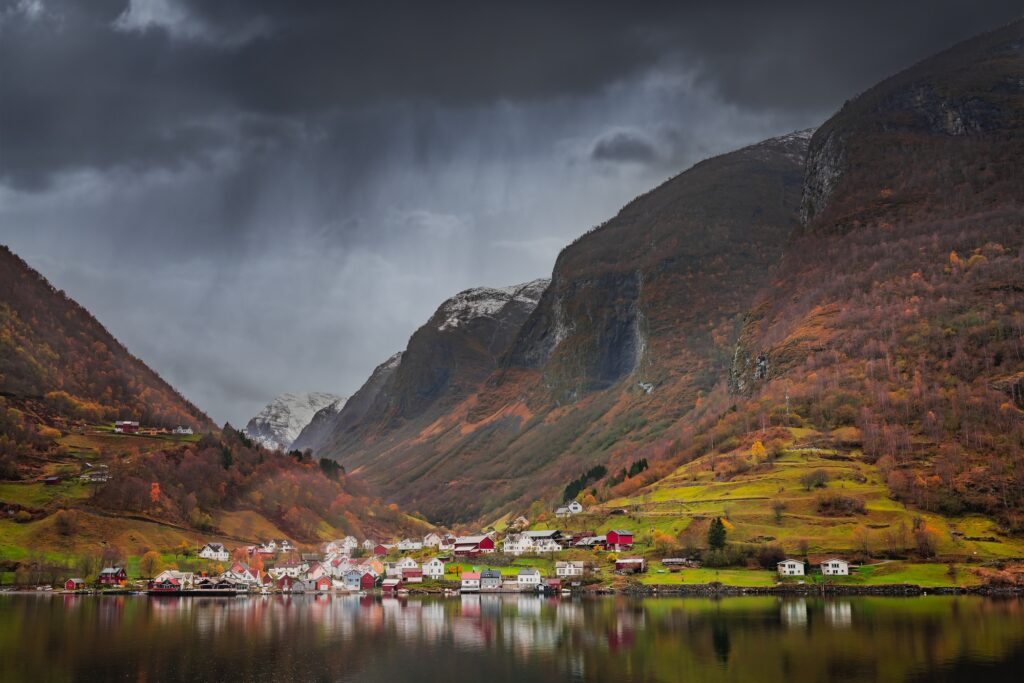 7 Enchanting Reasons to Embark on a Journey to Norway 2 Small homes on the shore of a fjord