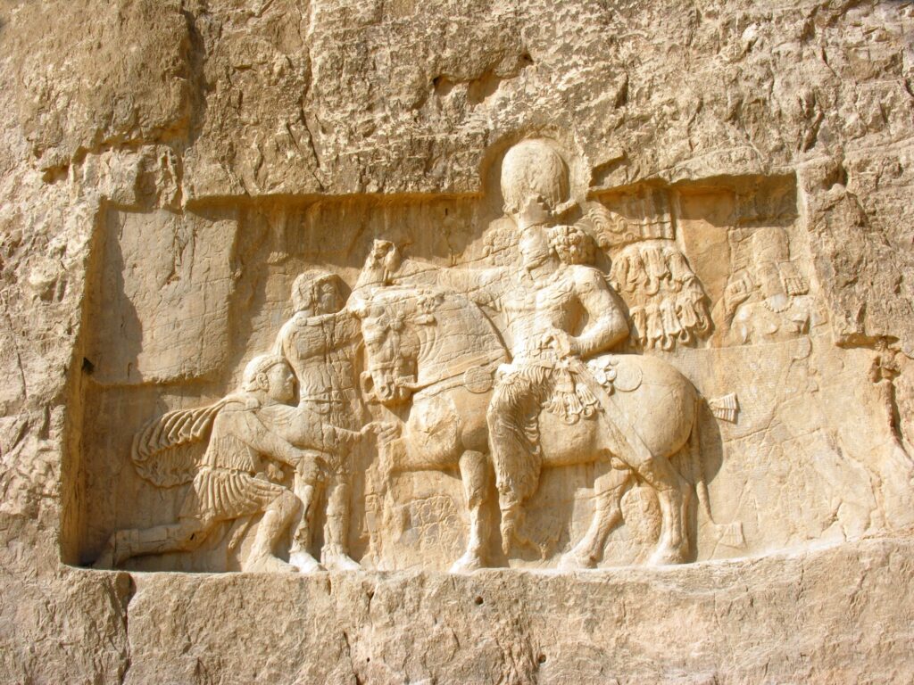 12 Enigmatic Lost Cities That Time Forgot 2 Stone carving in bas-relief on the Tomb of Darius the Great at Persepolis, Iran