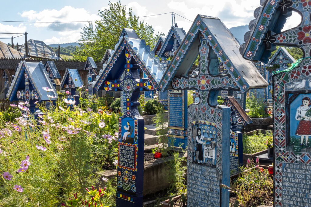 15 Extraordinary Destinations You Can’t Miss in Romania 10 Traditional Graves in Merry Cemetery in Maramures Region of Romania