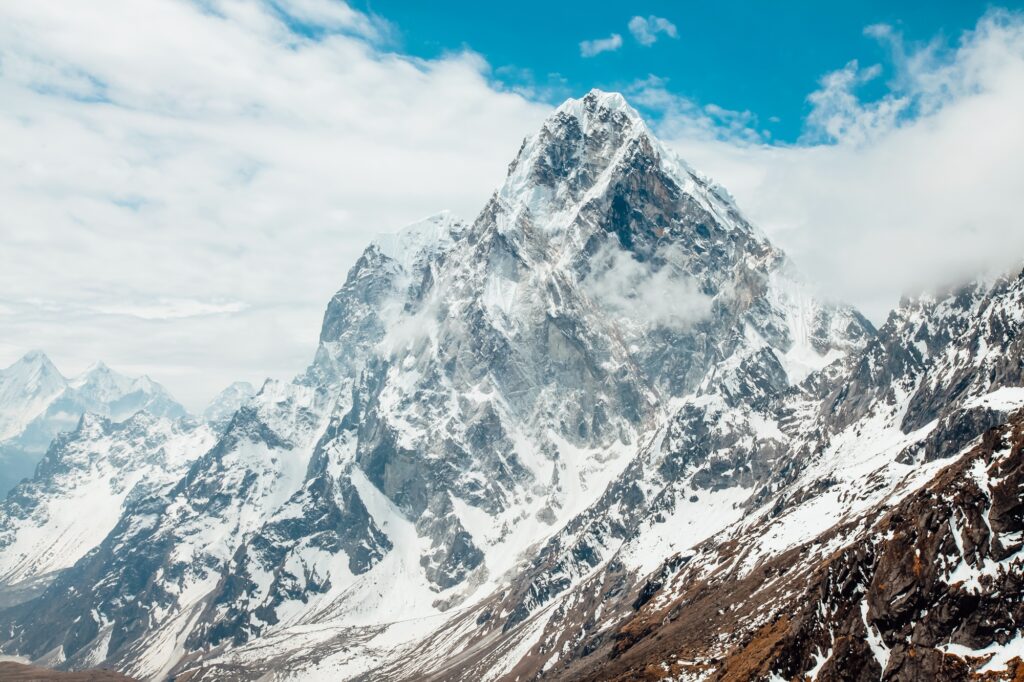 10 Extraordinary Natural Wonders You Can’t Miss 5 View of Ama Dablam on the way to Everest Base Camp with beautiful cloudy sky