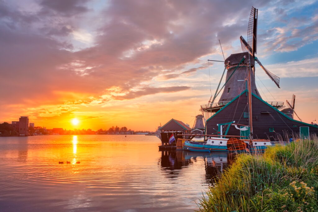 6 Enchanting Old Windmills You Have to See 6 Windmills at Zaanse Schans in Holland on sunset. Zaandam, Nether