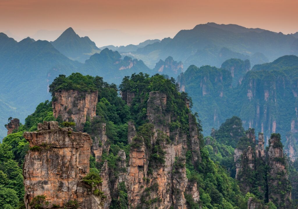 Explore China's Hidden Gems: 14 Must-Visit Destinations for Your Next Adventure 6 Zhangjiajie National forest park at sunset, Wulingyuan, Hunan, China