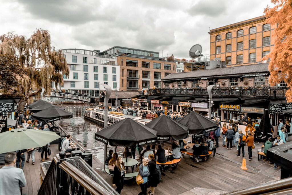 10 Enchanting Attractions to Experience in London 7 people sitting at tables near dock during daytime