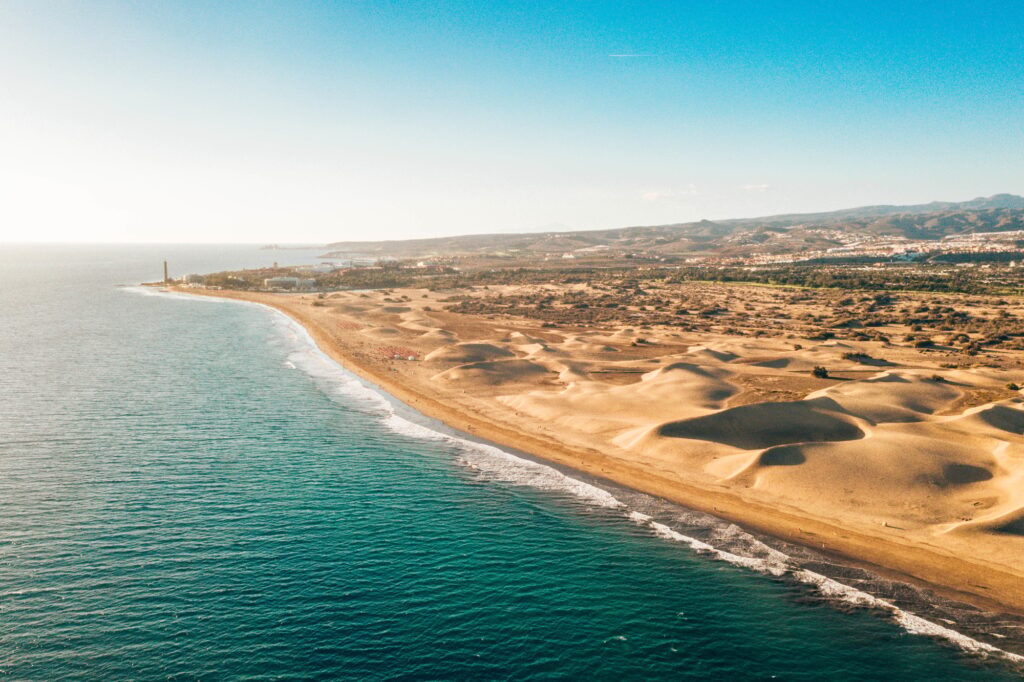 10 Enchanting Beaches in the Canary Islands You Cannot Miss 3 Aerial view of Maspalomas dunes on Gran Canaria island, Spain