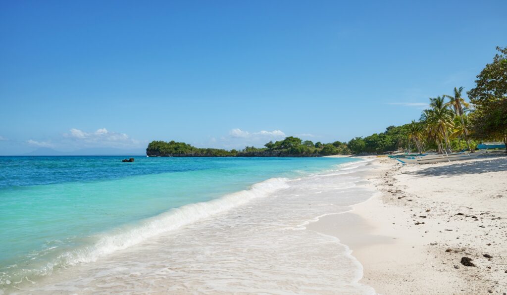 10 Enchanting Tourist Attractions in the Philippines You Can't Miss 9 Beautiful beach on Malapascua Island, Philippines.