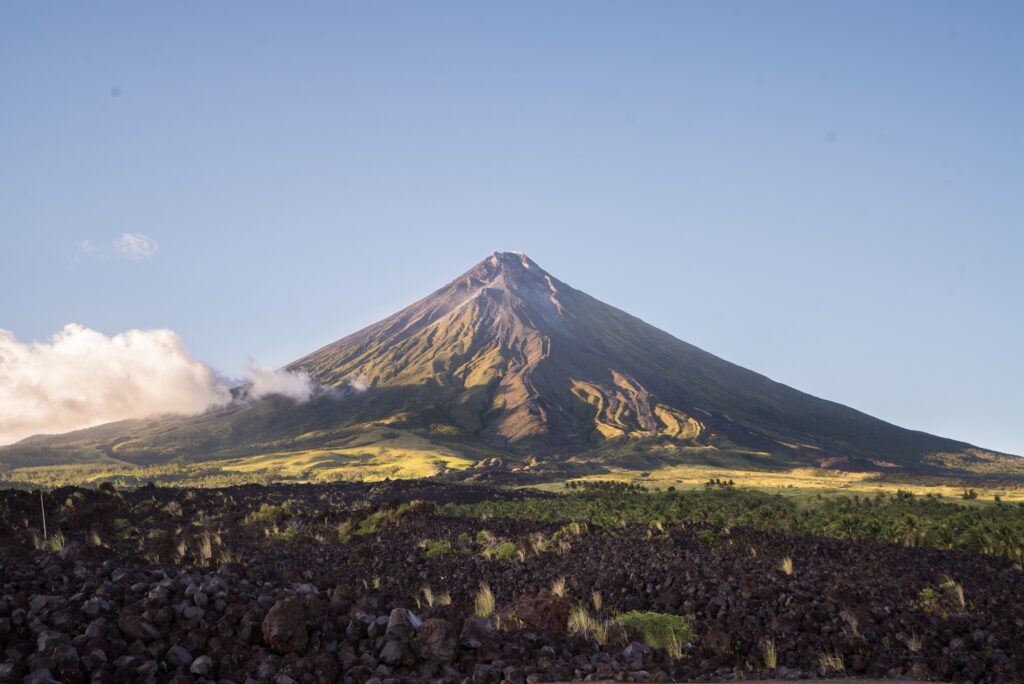 10 Enchanting Tourist Attractions in the Philippines You Can't Miss 2 Breathtaking view of Mount Mayon under the blue sky captured in Philippines