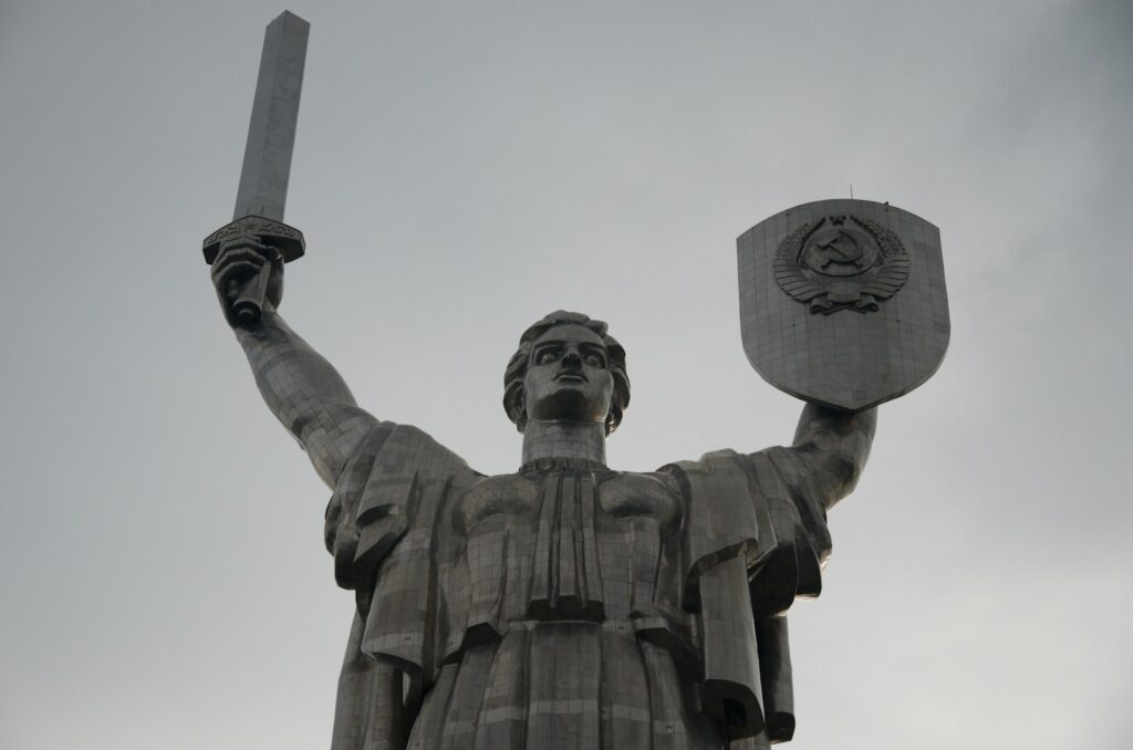 7 Extraordinary Statues Around the Globe That Impress with Their Grandeur 8 a statue of a man holding a sword and shield