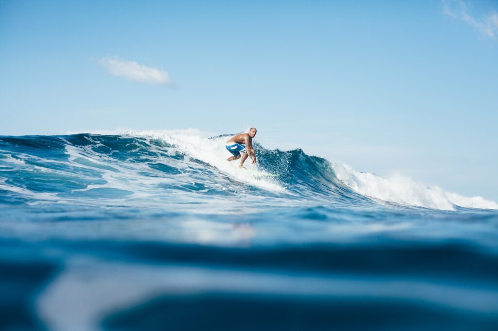 15 Extraordinary Places You Can’t Miss in Panama City 13 handsome young man surfing on sunny day