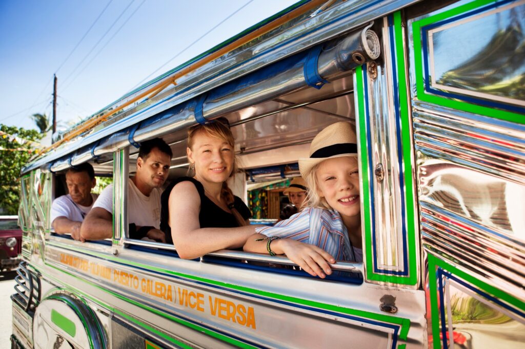 10 Enchanting Tourist Attractions in the Philippines You Can't Miss 11 Passengers sitting by bus window