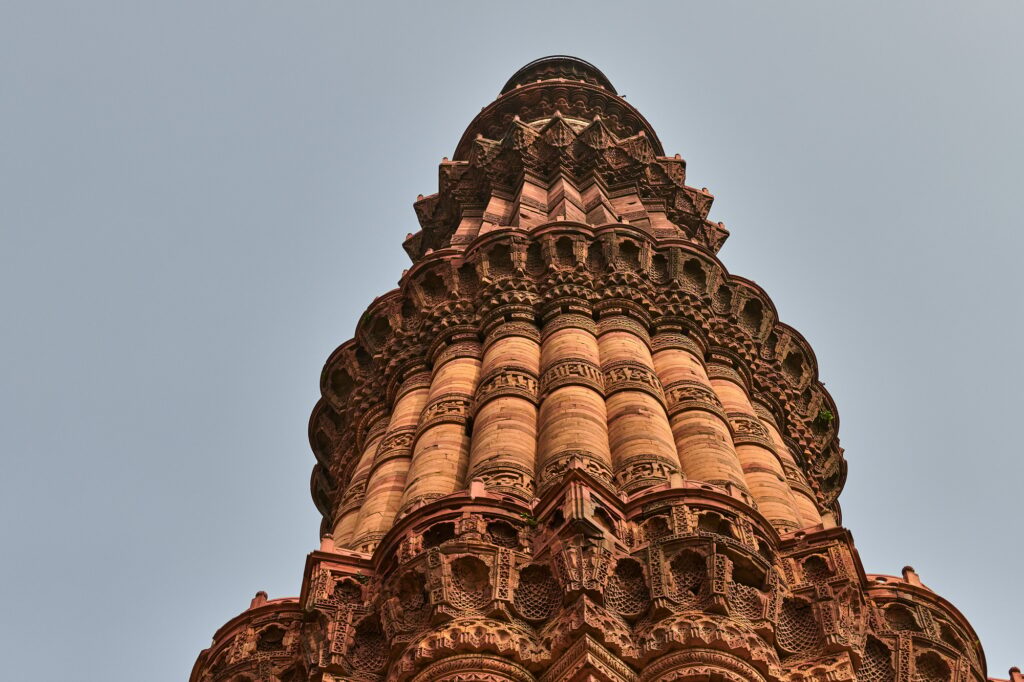 14 Iconic Towers from Around the Globe That Will Take Your Breath Away 9 Qutb Minar minaret tower part Qutb complex in South Delhi, India, big red sandstone minaret tower
