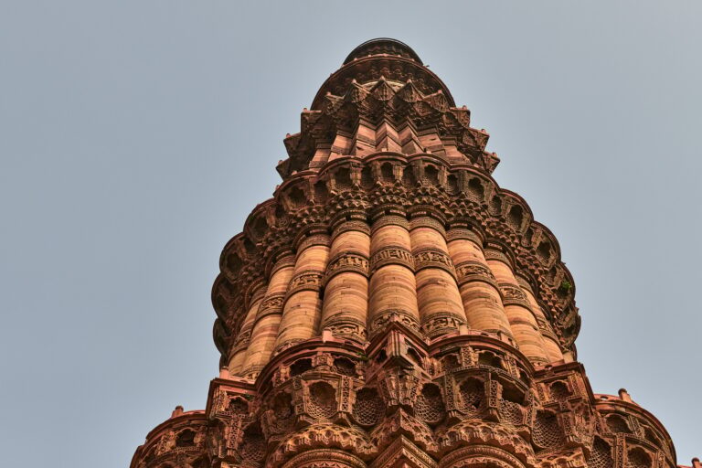 Qutb Minar minaret tower part Qutb complex in South Delhi, India, big red sandstone minaret tower