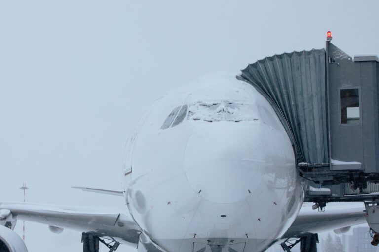 Snow covered plane during frosty winter day