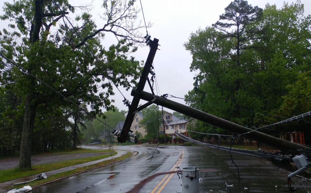 5 Compelling Reasons You Shouldn't Travel Without Insurance 2 Storm damaged electric transformer on a pole and a tree damaged